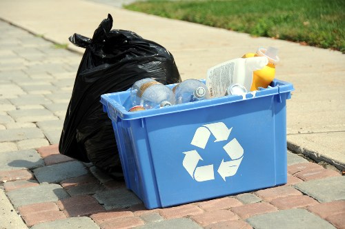 Business team utilizing a skip for waste disposal