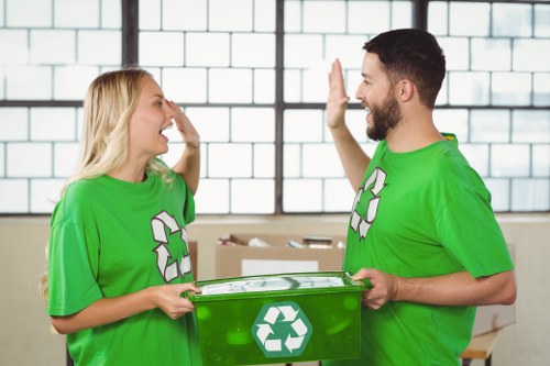 Professional team sorting demolition waste